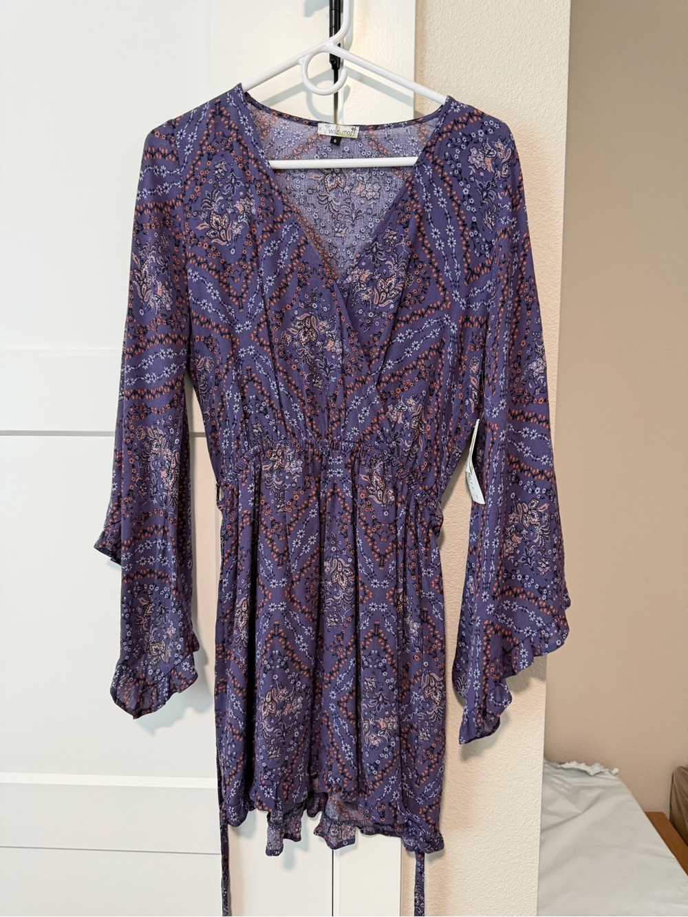 Women’s purple floral pattern dress size small NWT
Brand Wild moss